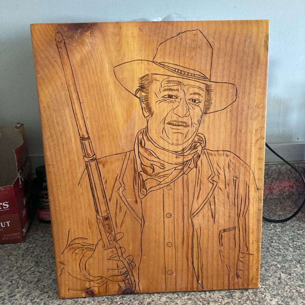 Wood burned picture of actor John Wayne